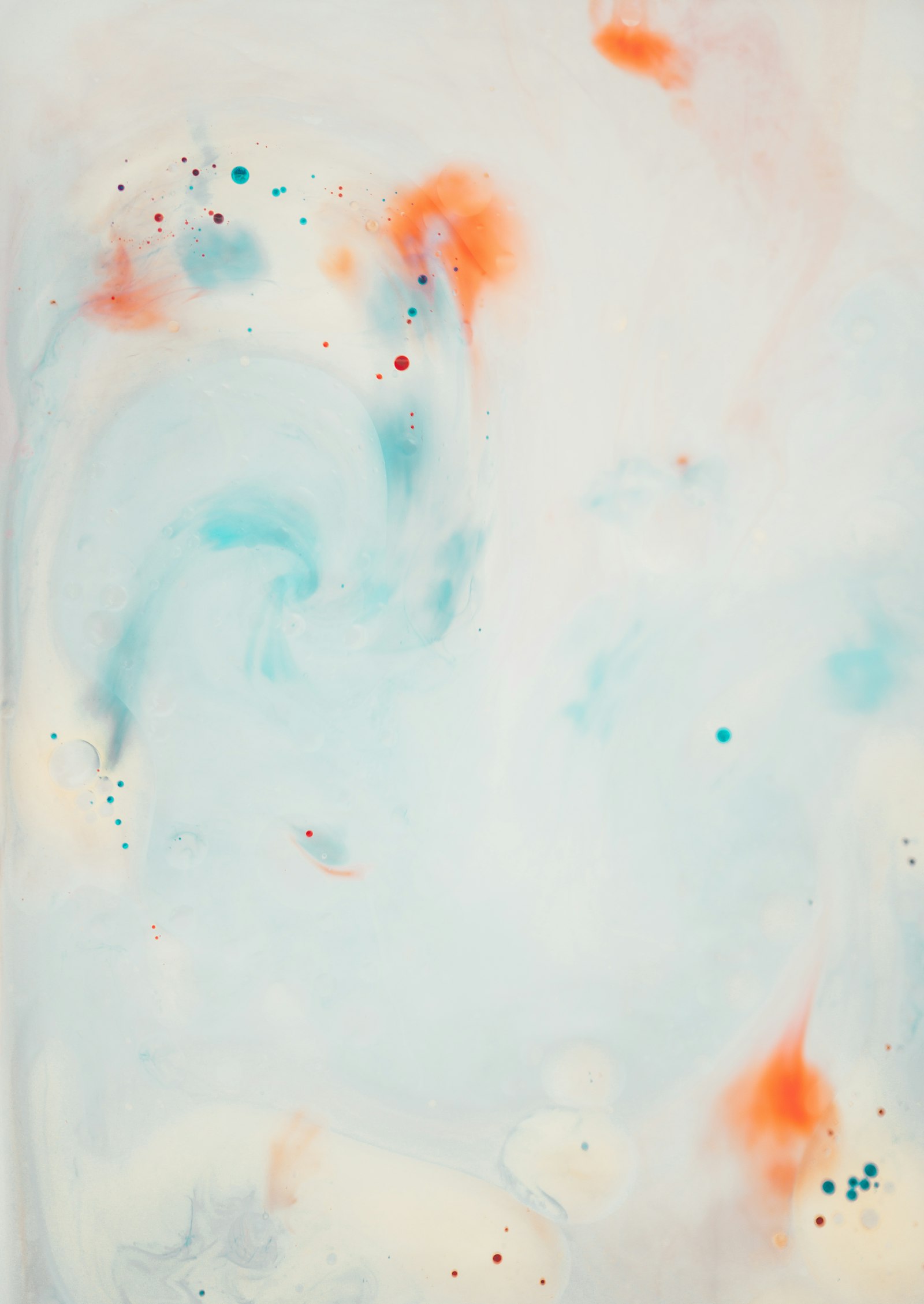 Pale blue and orange ink swirls on a white ground. It accompanies an article about Accessibility as a design quality bar.